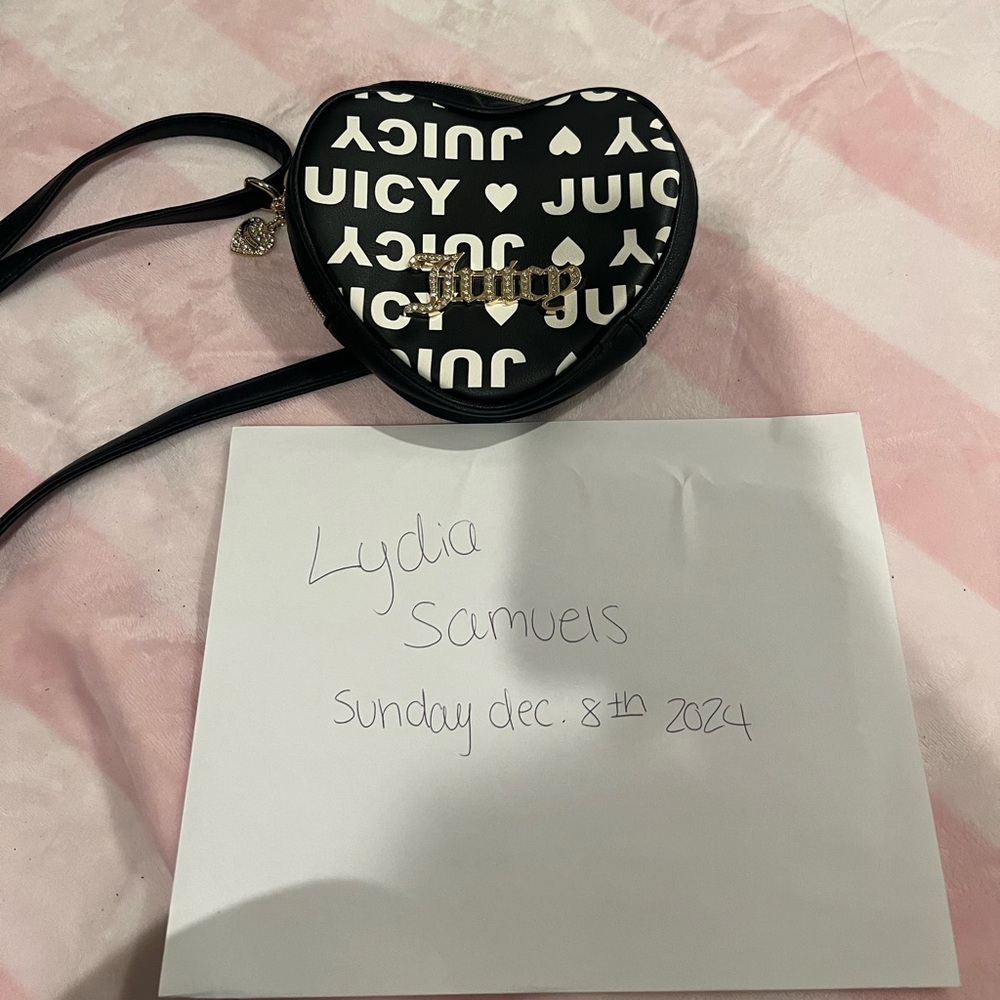 Heart shaped Juicy Couture crossbody purse.